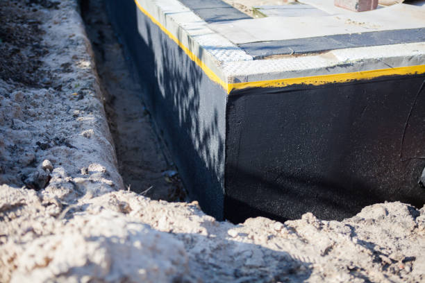 Professional Interior Drainage System technician working in Wellston, MI